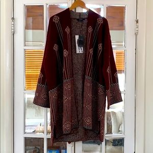 New with tags, Vertigo cardigan sweater. Size M